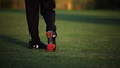 Golf player teeing off on a beautiful golf course