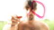 Man drawing infinity symbol into the air
