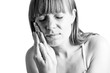 Attractive woman suffers from toothaches