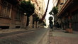Video: Light object passing trees and buildings of a street Light object passing trees and buildings of a street