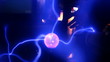 Plasma glass ball creating blue lightnings