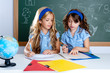 kids students in classroom helping each other kids students in classroom helping each other