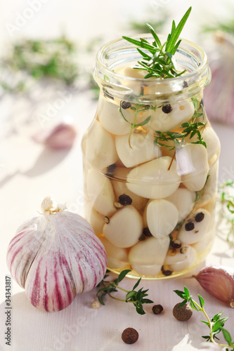 Photo: Pickled garlic with spices and herbs Pickled garlic with spices and herbs