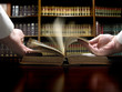 Hand on Law Book Hand on Law Book