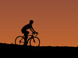 cyclist at sunset