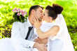 married caucasian couple passionately kissing in park married caucasian couple passionately kissing in park