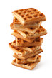 Foto: Big pile of fresh Belgian waffles on a white background Big pile of fresh Belgian waffles on a white background