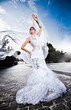 caucasian bride posing outdoor in white luxury dress caucasian bride posing outdoor in white luxury dress