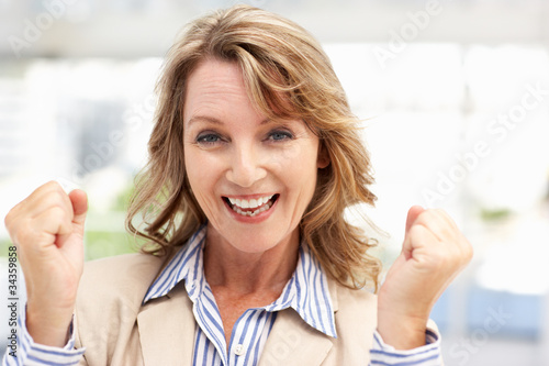 Photo: Successful mid age businesswoman Successful mid age businesswoman