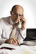 Friendly male professional on phone