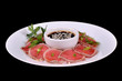Meat Carpaccio with Ponzu sauce isolated