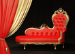 Royal sofa with gold frame. Curtain.