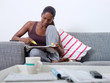 beautiful woman doing job hunting at home