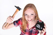 Amusing shot of young girl with her piggy bank