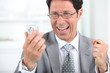 Businessman on the phone laughing