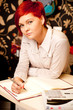 Female sales assistant in clothing store