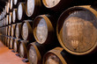 port wine ages in barrels in cellar