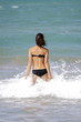 Il bagno tra onde spumeggianti Il bagno tra onde spumeggianti