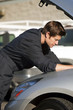 mechanic fixing car