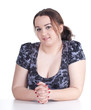 smiling fat beautiful young woman in dark dress