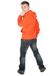 frightened young man in orange sweatshirt, full length, series