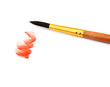 brush with red paint stroke and stick,