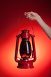 Photo: Woman holding kerosene lantern Woman holding kerosene lantern