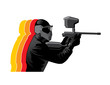 Paintball player in black uniform with marker gun