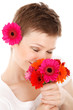 smelling bouquet of flowers