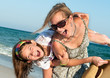 Mother and daughter at the beach
