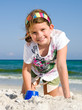 Girl playing in the sand
