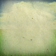 Image of sky and green field on old paper Image of sky and green field on old paper