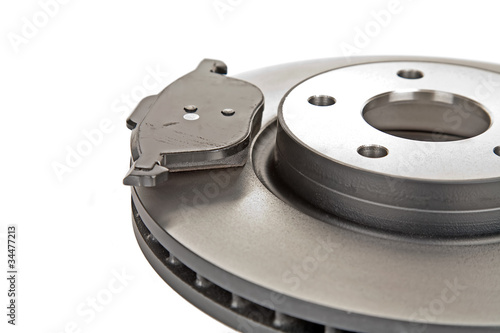 Photo: brake disk and one brake pad brake disk and one brake pad