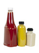 Ketchup, Mustard and Horseradish in Bottles; Angle View
