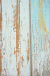 Blue peeling paint on wall.