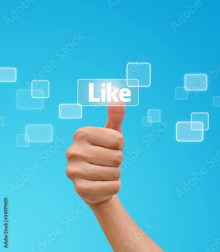 Photo: Hand pressing Like button Hand pressing Like button