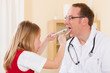 Foto: Child is examining throat of her doctor Child is examining throat of her doctor