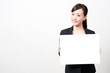 asian businesswoman with blank whiteboard