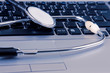 Medical stethoscope on a laptop computer, closeup