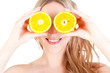 beautiful woman holding orange