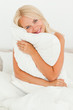 Woman holding a pillow Woman holding a pillow