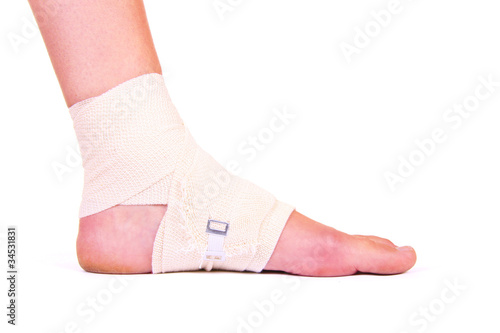 Photo: injured ankle with bandage injured ankle with bandage