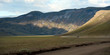 two 4wd vehicles on the dusty roads to Landmannalaugar, Iceland.