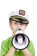Little boy in green t-shirt and in sea peaked cap says something