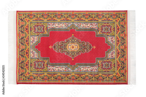 Photo: Rectangular red carpet horizontally lies on white background Rectangular red carpet horizontally lies on white background