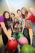 Friends are taken by balls for playing in bowling Friends are taken by balls for playing in bowling