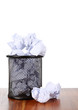Garbage bin with waste paper