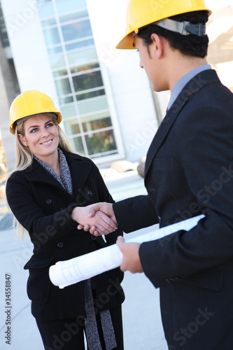 Photo: Business Construction Man and Woman Business Construction Man and Woman