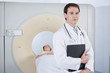 Smiling medical doctor with stethoscope