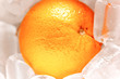 Orange on ice.Sweet and cool